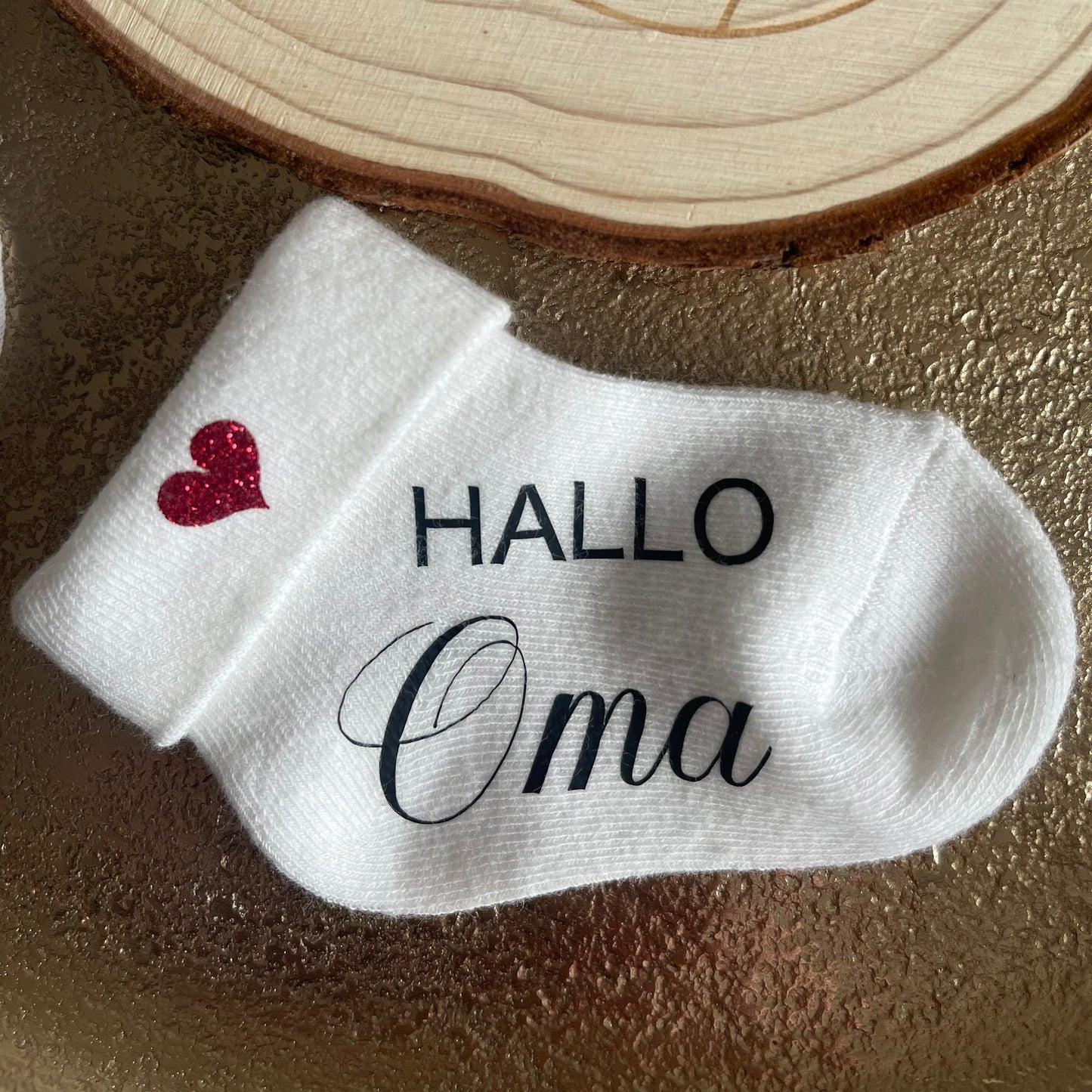 Babysocke zur Schwangerschaftsverkündung